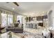 Living area with seamless access to the island kitchen, promoting a modern living style at 5650 Pleasant Palms St, North Las Vegas, NV 89081