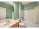 Bathroom featuring a tub, vanity, toilet, and framed mirror at 5960 Wheat Penny Ave, Las Vegas, NV 89122