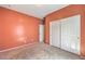 Spacious carpeted bedroom featuring a closet at 5960 Wheat Penny Ave, Las Vegas, NV 89122