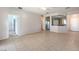 Open floor plan with tile flooring leading to the kitchen and other living areas at 5960 Wheat Penny Ave, Las Vegas, NV 89122