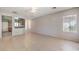 Bright, open living area with tile floors and a view into the kitchen at 5960 Wheat Penny Ave, Las Vegas, NV 89122