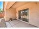 Covered patio with concrete flooring and sliding glass door at 5960 Wheat Penny Ave, Las Vegas, NV 89122