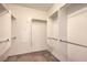 Spacious walk-in closet with built-in shelving and rods for optimal storage at 5960 Wheat Penny Ave, Las Vegas, NV 89122