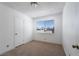 Bedroom with neutral carpet, window, and closet at 6121 Iris Cir, Las Vegas, NV 89107