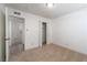 Bedroom with neutral carpet and closet at 6121 Iris Cir, Las Vegas, NV 89107