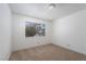 Bedroom with neutral carpet, window, and closet at 6121 Iris Cir, Las Vegas, NV 89107