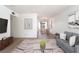 Bright living room boasts modern decor, hardwood floors and ample space for relaxation at 6121 Iris Cir, Las Vegas, NV 89107
