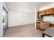 Open floor plan with lots of natural light and neutral paint and flooring at 6121 Iris Cir, Las Vegas, NV 89107