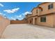 Open backyard featuring a paved patio area, perfect for outdoor activities and relaxation at 6354 Point Isabel Way, Las Vegas, NV 89122