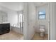 Bathroom featuring a soaking tub, a separate toilet room, and stylish finishes at 6354 Point Isabel Way, Las Vegas, NV 89122