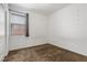 Bedroom with carpet flooring, white walls, and a window at 6354 Point Isabel Way, Las Vegas, NV 89122