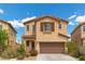Charming two-story home with a two-car garage and well-maintained landscaping at 6354 Point Isabel Way, Las Vegas, NV 89122