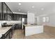 Modern kitchen featuring stainless steel appliances and granite countertops at 6354 Point Isabel Way, Las Vegas, NV 89122