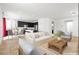 Bright, open-concept living room and kitchen with modern furnishings at 6354 Point Isabel Way, Las Vegas, NV 89122