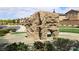 A large artificial rock climbing structure for in a well-maintained community park at 6354 Point Isabel Way, Las Vegas, NV 89122