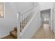 Interior staircase featuring carpeted steps and a white railing at 6354 Point Isabel Way, Las Vegas, NV 89122
