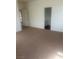 Bedroom with plush carpeting and a view of the adjacent bathroom at 7228 Chic Ave, Las Vegas, NV 89129