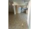 Kitchen featuring light-colored cabinetry, appliances, tile flooring, and natural lighting at 7228 Chic Ave, Las Vegas, NV 89129