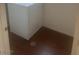 A utility area with a white washing machine is located on a brown floor at 7228 Chic Ave, Las Vegas, NV 89129