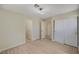 Bedroom featuring wood-look floors and a closet at 7924 Horn Tail Ct, Las Vegas, NV 89131
