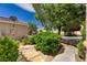Home exterior showcasing well-maintained landscaping, a decorative tiled roof, and exterior fixtures at 7924 Horn Tail Ct, Las Vegas, NV 89131
