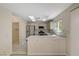 Bright modern kitchen with stainless appliances and stone accents at 7924 Horn Tail Ct, Las Vegas, NV 89131