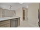 Kitchen with stainless dishwasher and large pantry storage at 7924 Horn Tail Ct, Las Vegas, NV 89131