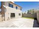 Spacious concrete patio and artificial grass provide low-maintenance outdoor living behind this home at 795 Kiska Ave, Las Vegas, NV 89123