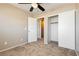 Cozy bedroom featuring plush carpeting, ample closet space, and neutral color palette at 795 Kiska Ave, Las Vegas, NV 89123