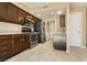 Functional kitchen with stainless steel appliances and ample cabinet storage at 795 Kiska Ave, Las Vegas, NV 89123