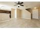 Open concept living area features tile flooring and seamless flow into the kitchen at 795 Kiska Ave, Las Vegas, NV 89123