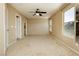 Spacious main bedroom with walk-in closet, ceiling fan, and neutral walls at 795 Kiska Ave, Las Vegas, NV 89123