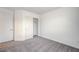 Cozy bedroom with neutral carpet, white walls, closet and interior door at 8056 Haywood Estate Ave, Las Vegas, NV 89113