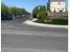 Community entrance with sign surrounded by lush landscaping at 8056 Haywood Estate Ave, Las Vegas, NV 89113