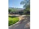 A covered seating area and manicured grounds in the community park offers residents a place to relax at 8056 Haywood Estate Ave, Las Vegas, NV 89113