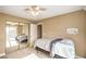 Bright bedroom with a mirrored closet and access to an outdoor balcony for fresh air and natural light at 824 Schooner Dr, Henderson, NV 89015