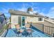 Relax on this home's private deck with table and chairs, perfect for enjoying the fresh air at 824 Schooner Dr, Henderson, NV 89015