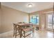 Bright dining area with a square table and lots of natural light at 824 Schooner Dr, Henderson, NV 89015