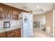 Bright kitchen with stainless appliances, granite countertops, and breakfast nook at 824 Schooner Dr, Henderson, NV 89015