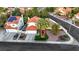 This aerial shows the home with mature palms in a planned community, close to schools and amenities at 8388 Brad Oaks Cir, Las Vegas, NV 89123