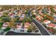 This beautiful community shows mature trees and landscaping, sidewalks, and many similar single Gathering homes at 8388 Brad Oaks Cir, Las Vegas, NV 89123