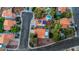 An aerial view shows the community with lush mature landscaping, swimming pools and mature trees and walkways at 8388 Brad Oaks Cir, Las Vegas, NV 89123
