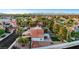 Great aerial view of the home in a mature neighborhood with palm trees near Las Vegas and the mountains at 8388 Brad Oaks Cir, Las Vegas, NV 89123