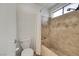 Bathroom featuring a tiled shower/tub with a white shower curtain and neutral tones at 8388 Brad Oaks Cir, Las Vegas, NV 89123