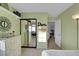 Bedroom with ample storage featuring a mirrored closet and bright, natural light at 8388 Brad Oaks Cir, Las Vegas, NV 89123
