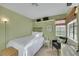 Cozy bedroom with neutral decor, comfortable furnishings, and natural light at 8388 Brad Oaks Cir, Las Vegas, NV 89123