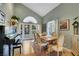 Dining room with hardwood floors and access to an outdoor space at 8388 Brad Oaks Cir, Las Vegas, NV 89123