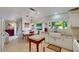 Open concept kitchen and dining space featuring ample natural light at 8388 Brad Oaks Cir, Las Vegas, NV 89123