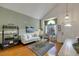 Bright and airy living space with hardwood floors and natural light at 8388 Brad Oaks Cir, Las Vegas, NV 89123