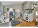 Comfortable living room with hardwood floors, high ceilings, and natural light at 8388 Brad Oaks Cir, Las Vegas, NV 89123